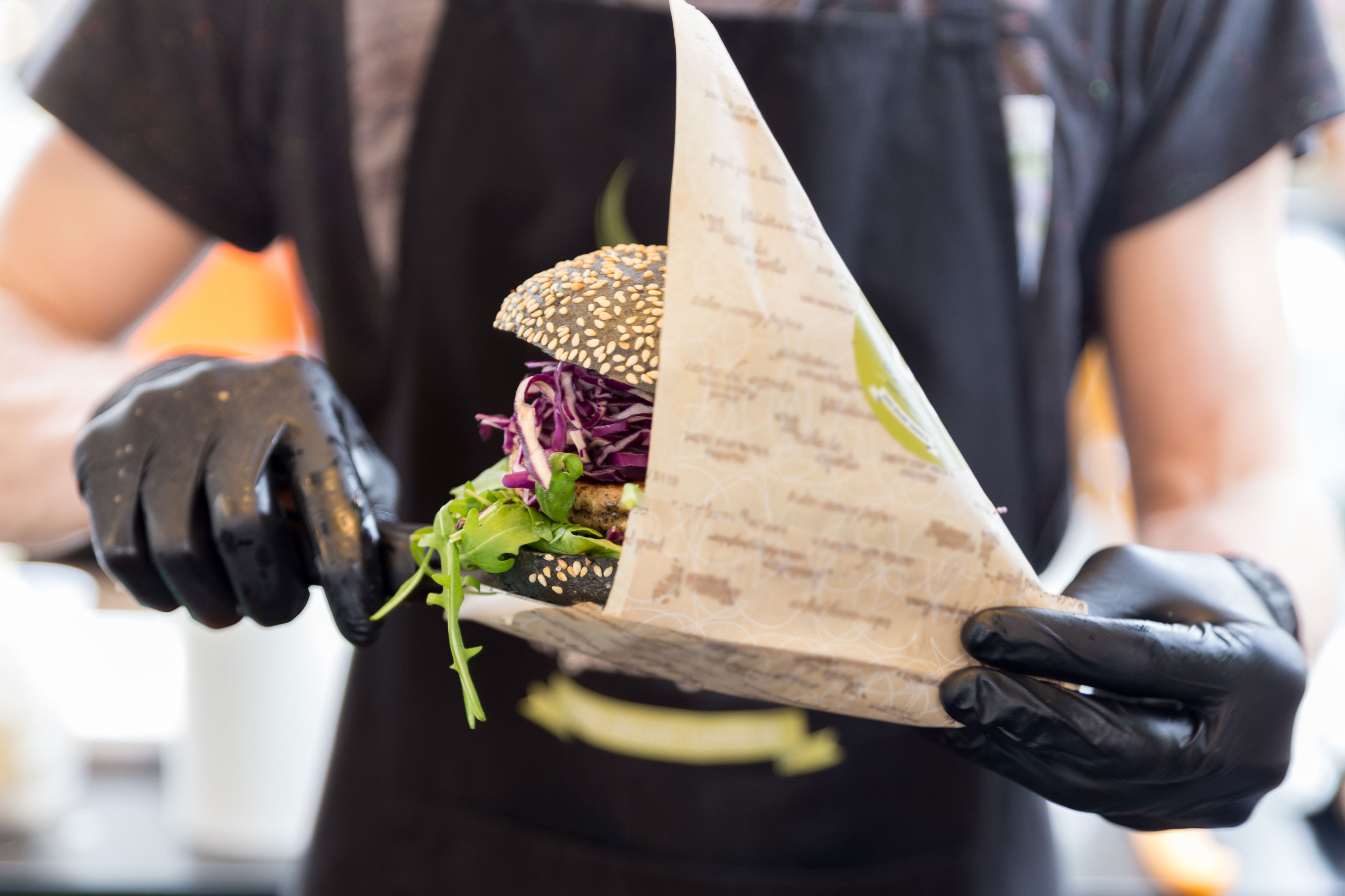 Vendor serving vegetarian burger