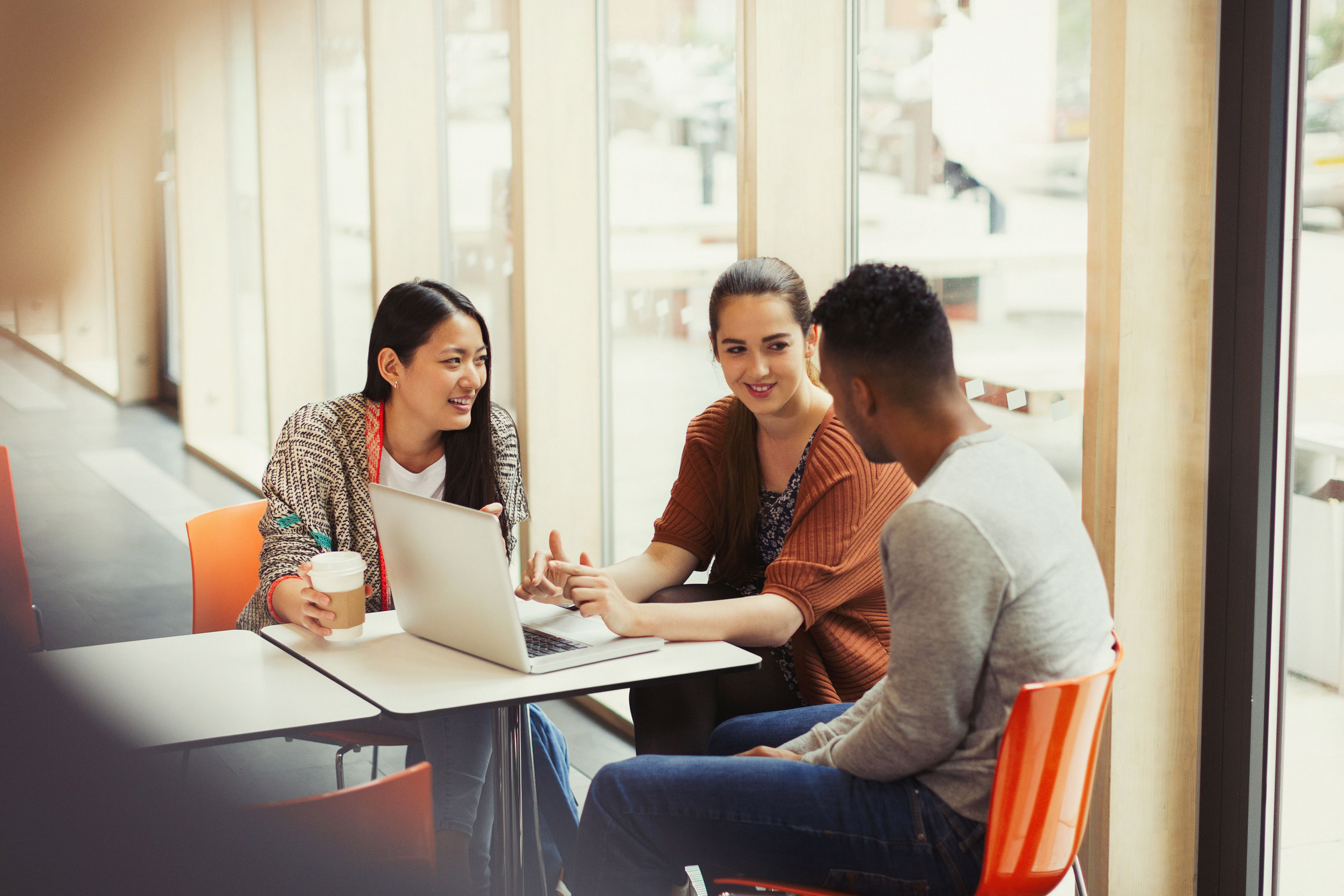 College students connecting in a cafeteria