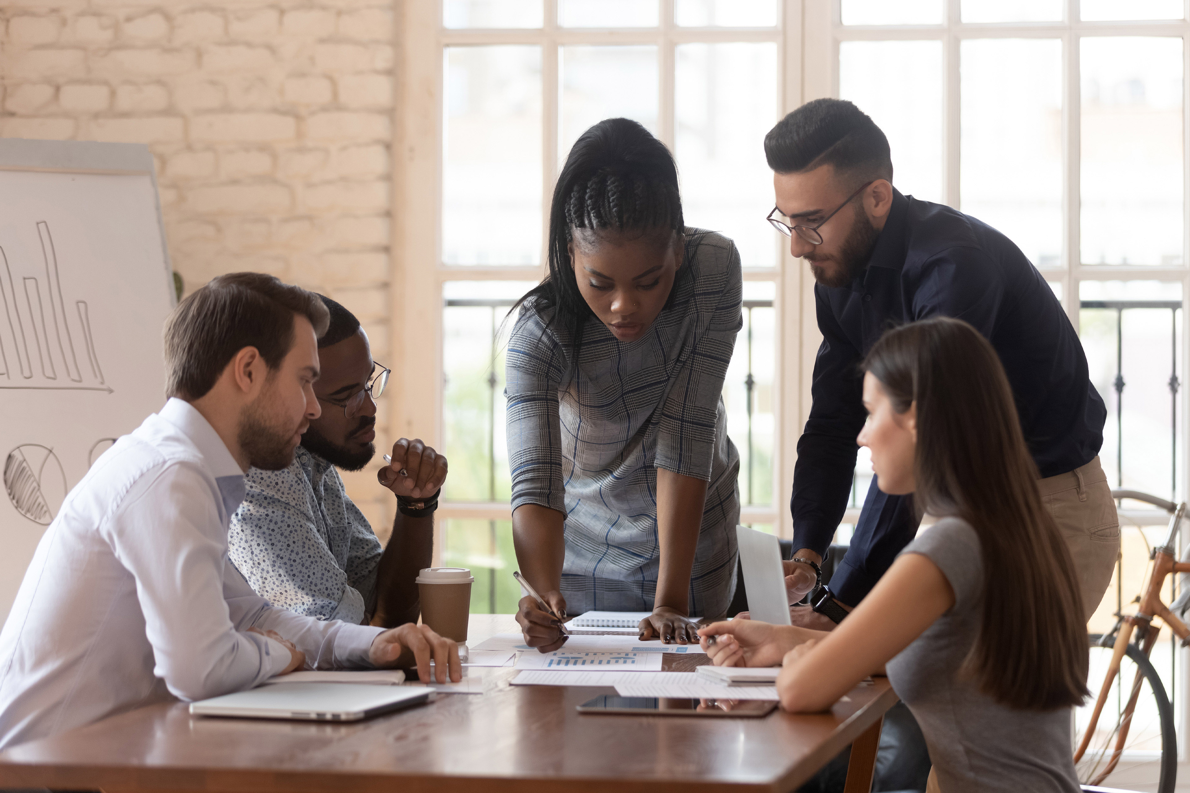 Diverse colleagues working on project