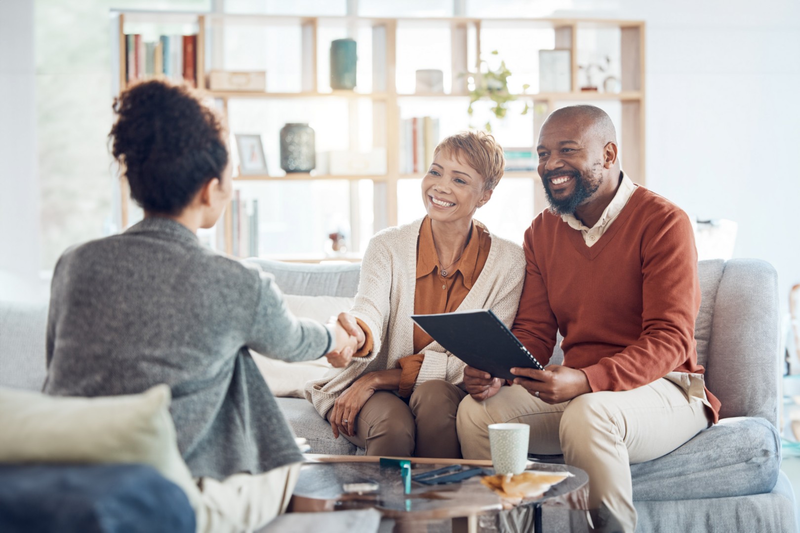 Business meeting welcome handshake and couple meet with lawyer or financial advisor