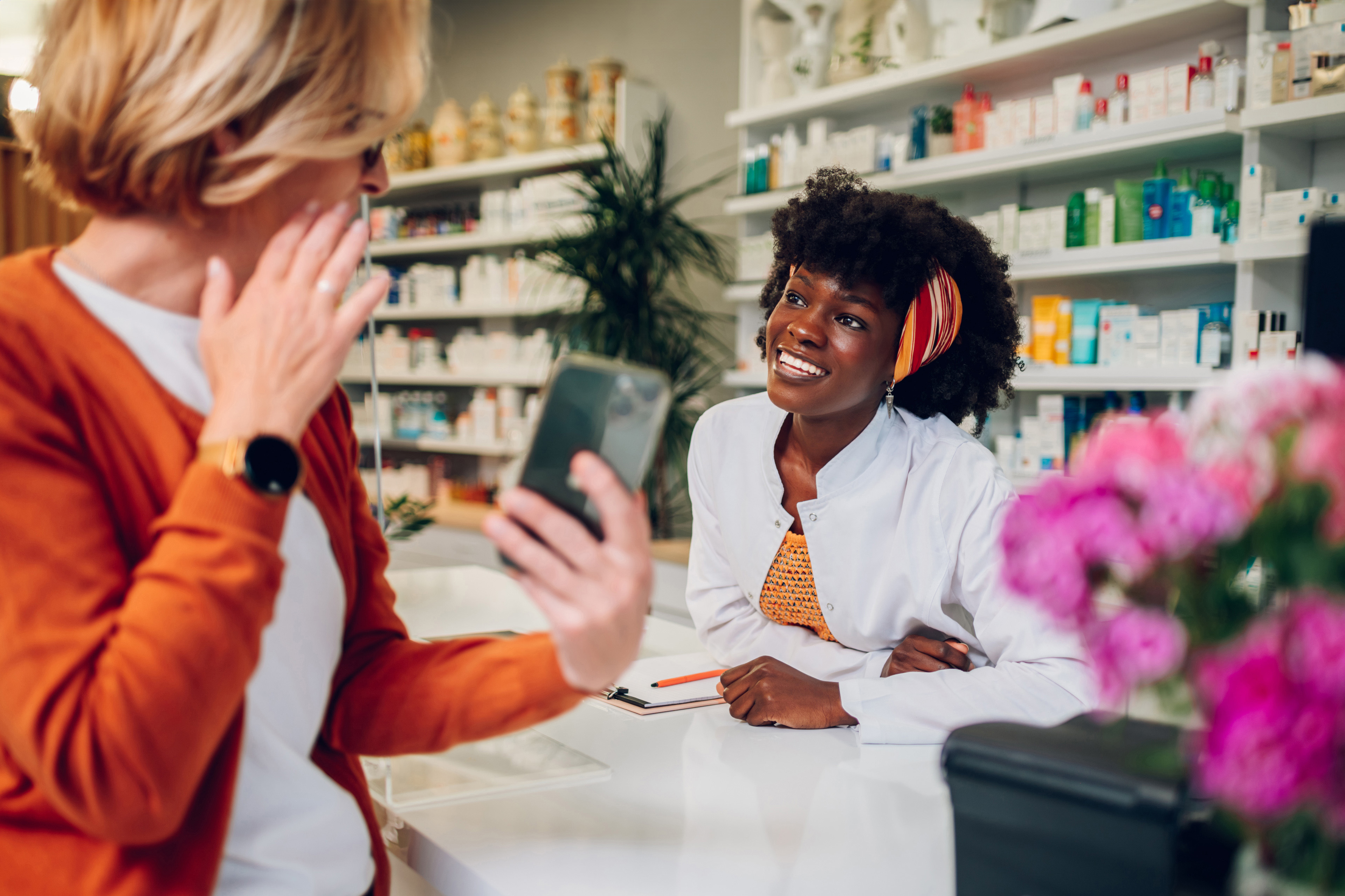 smiling woman healthcare worker modern pharmacy