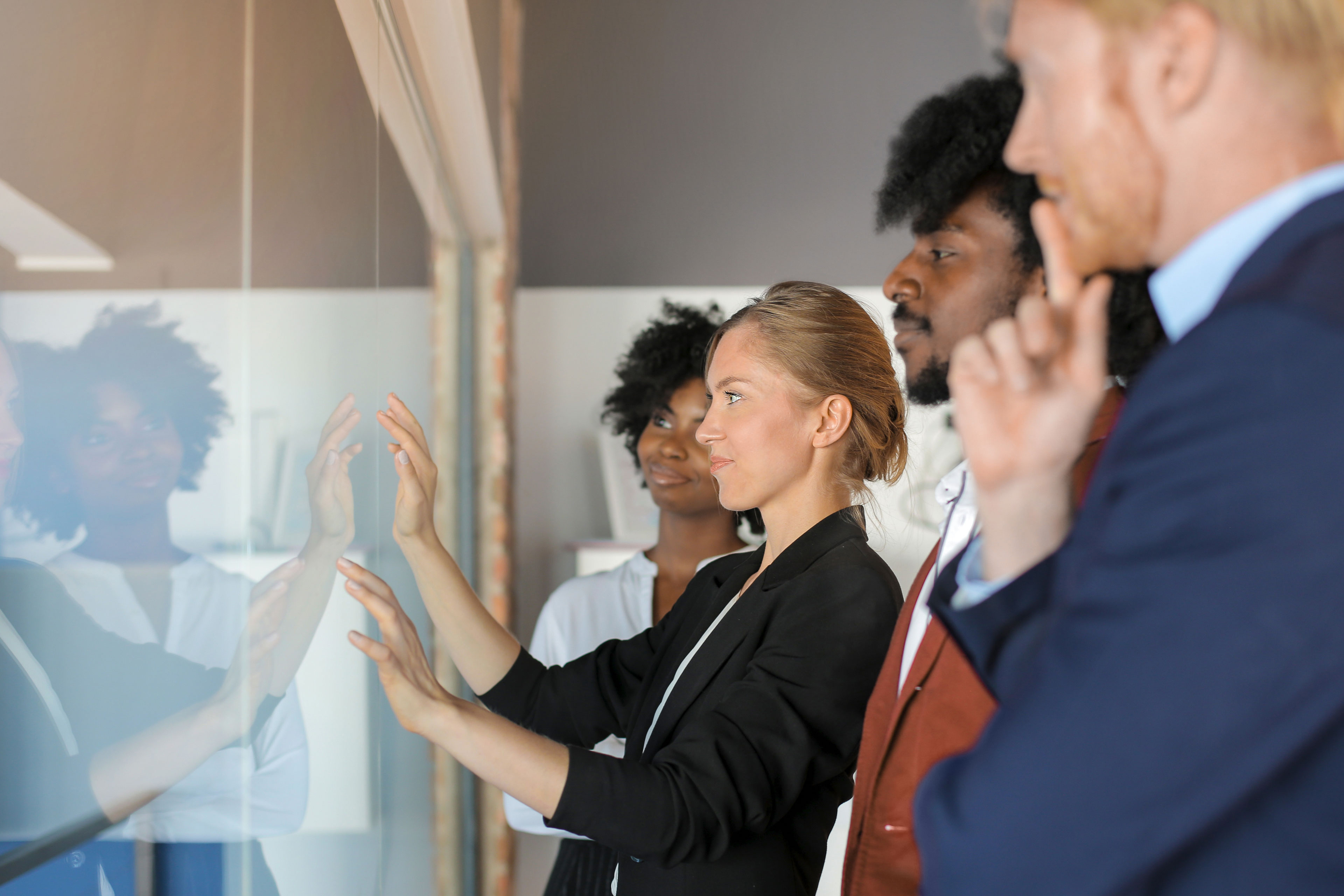 Business team viewing workboard