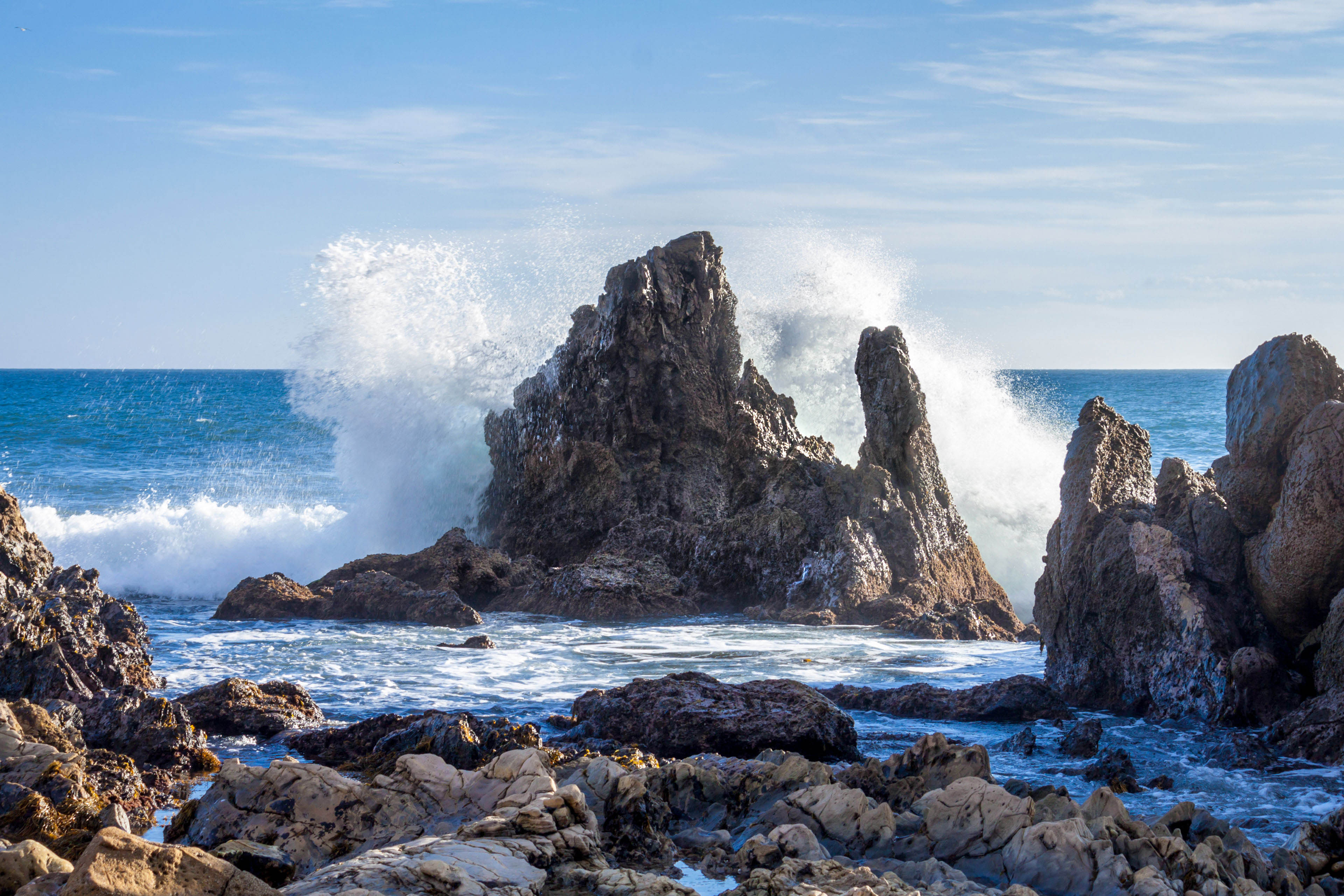 Waves crashing on rocks