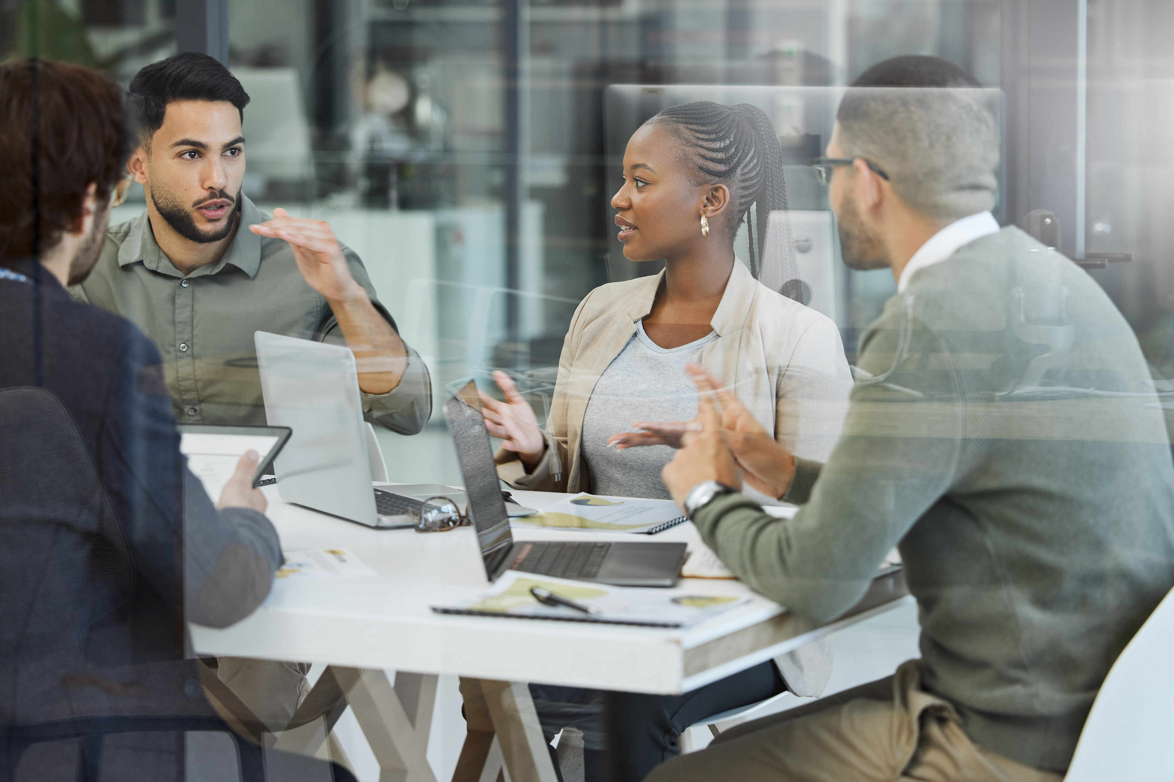 Meeting, collaboration and business people in discussion in the office