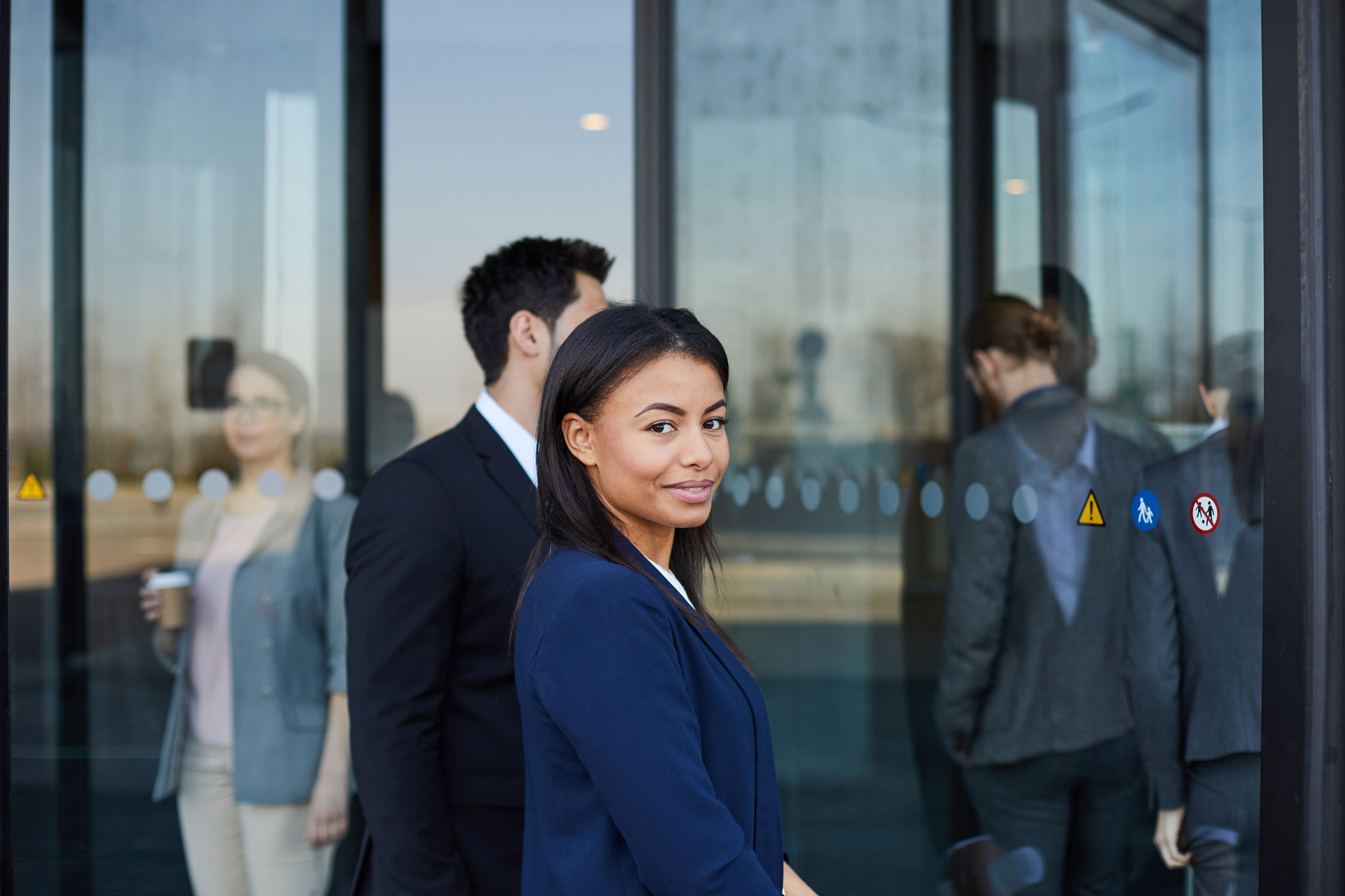 Woman walking in office building