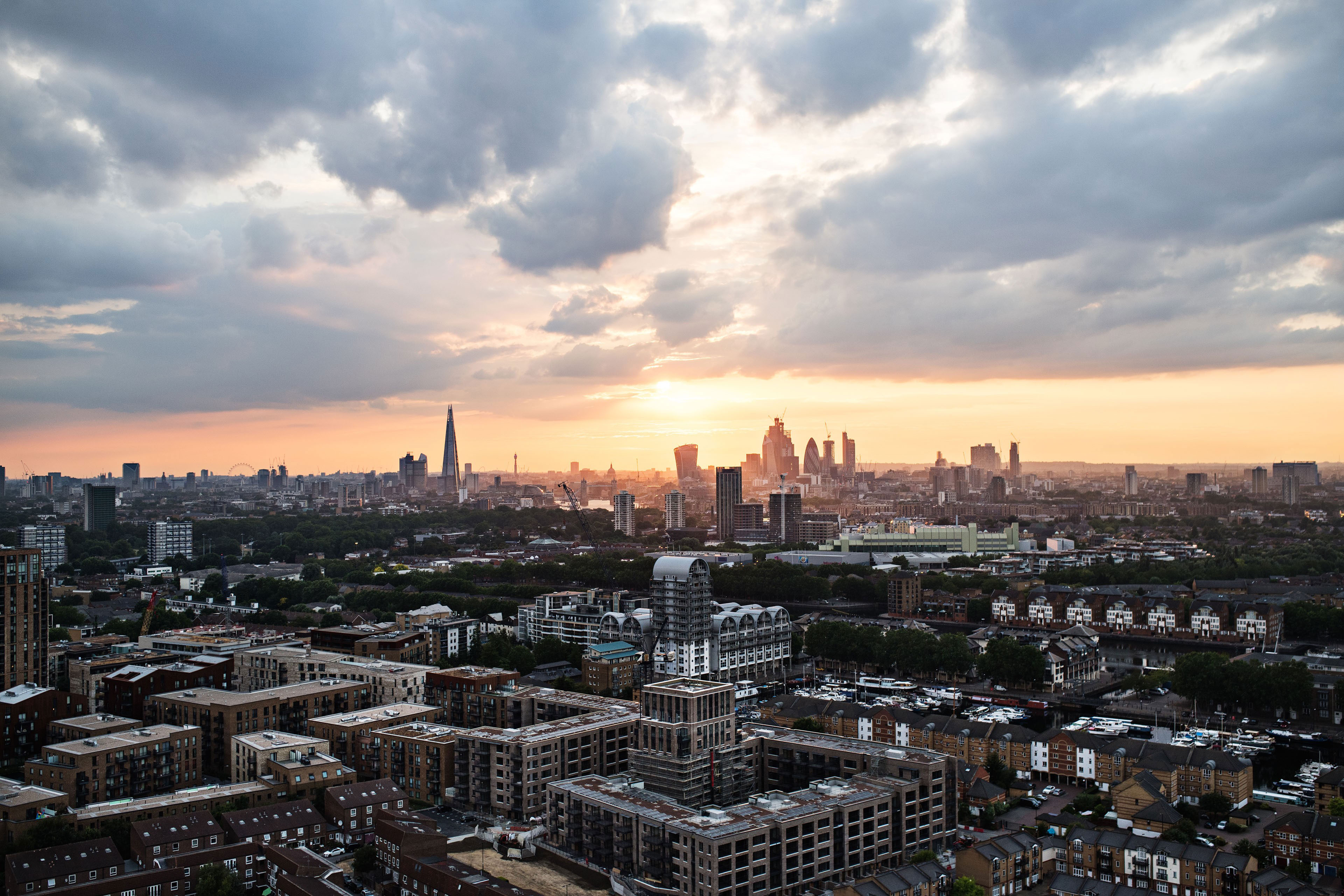 A sunset over a skyline of london