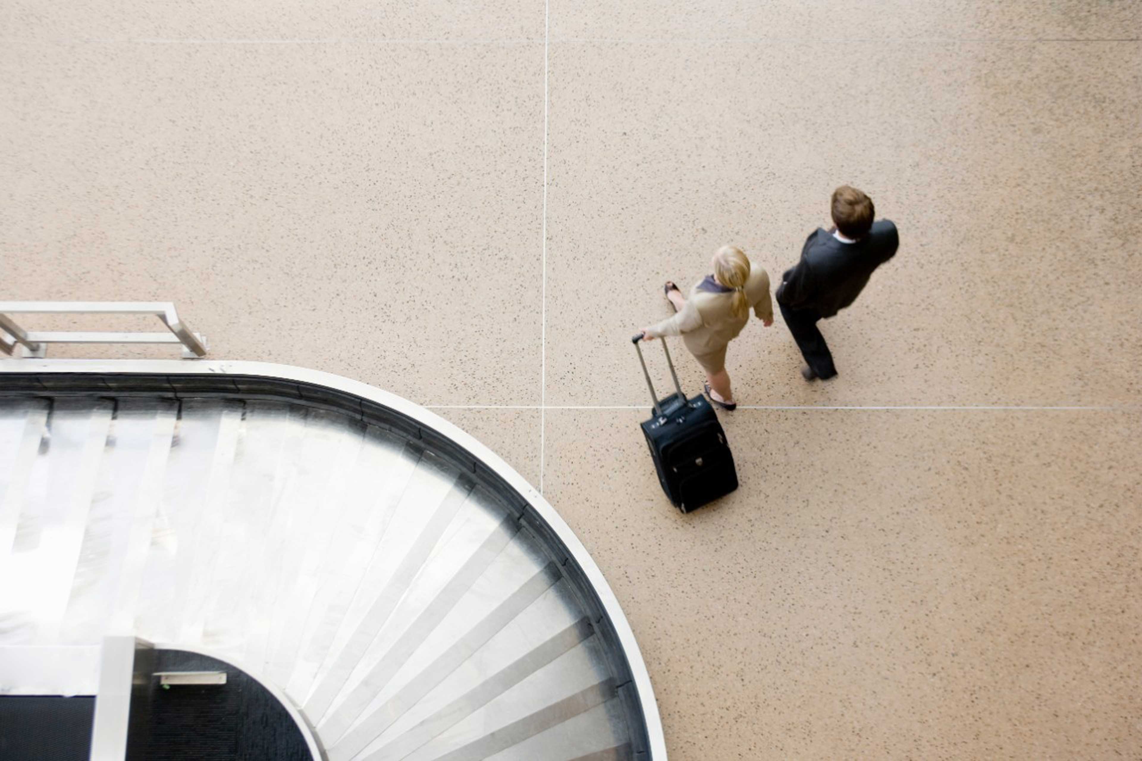 Ey woman with suitcase