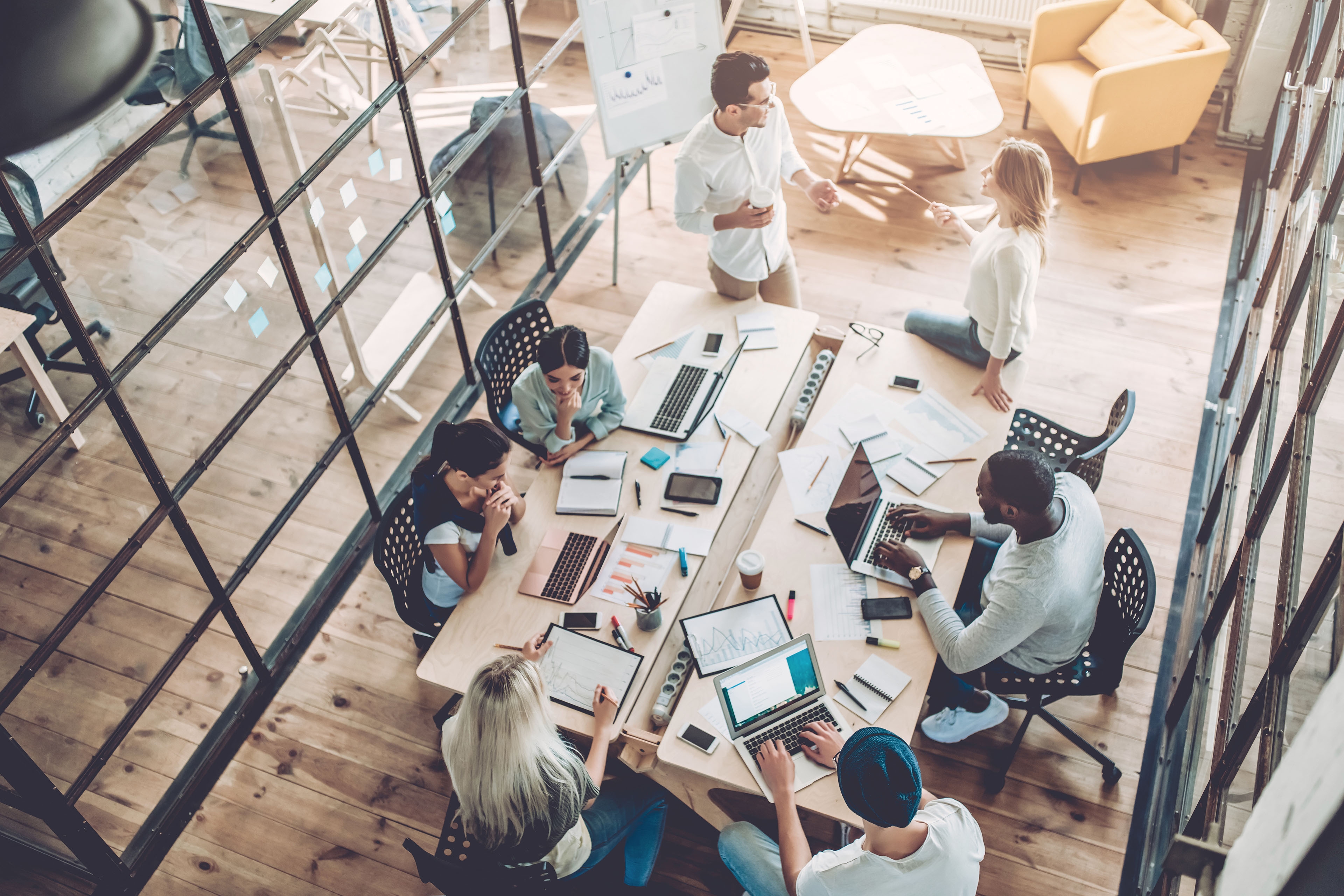 Young people work on modern office