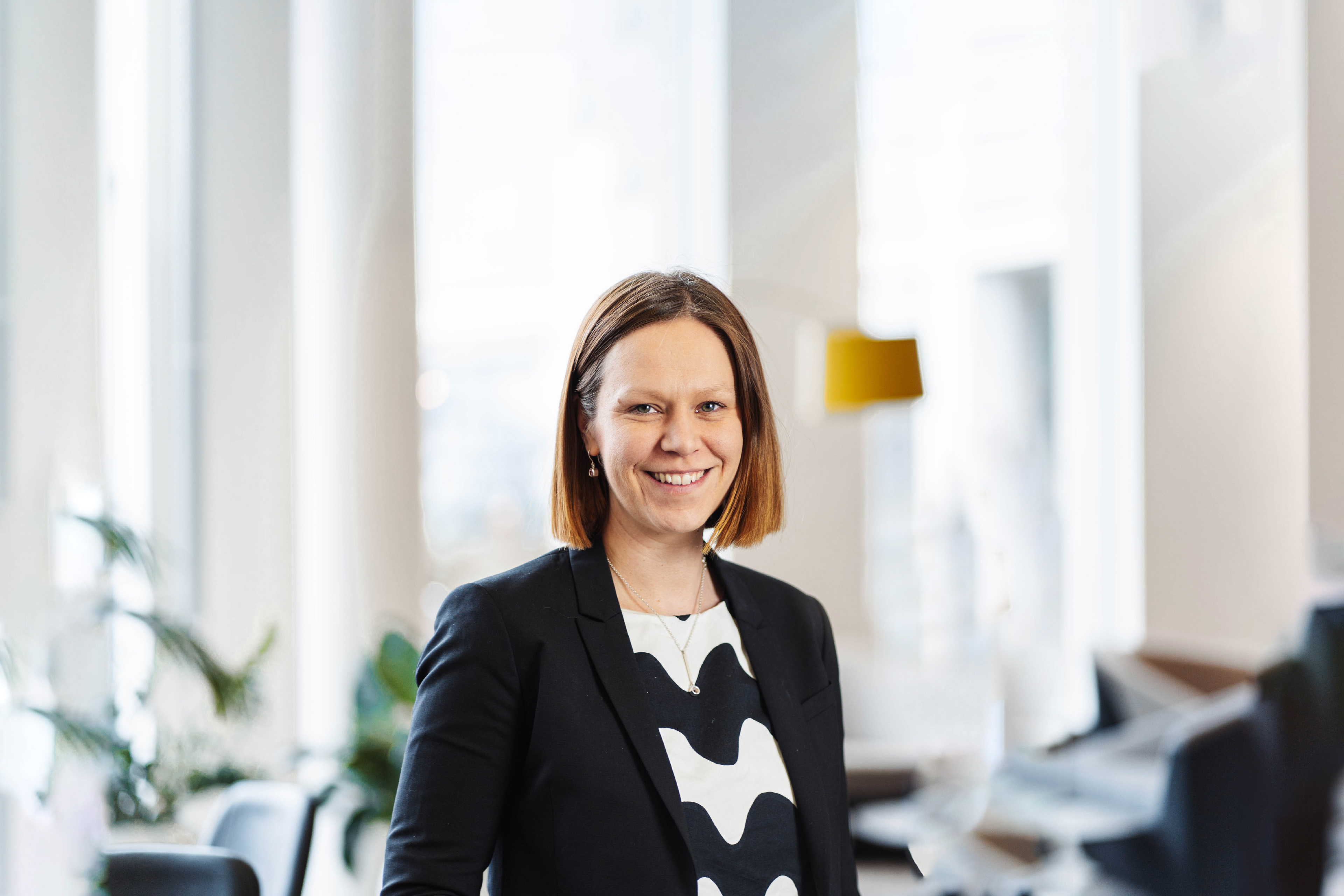 A woman in the EY Helsinki office