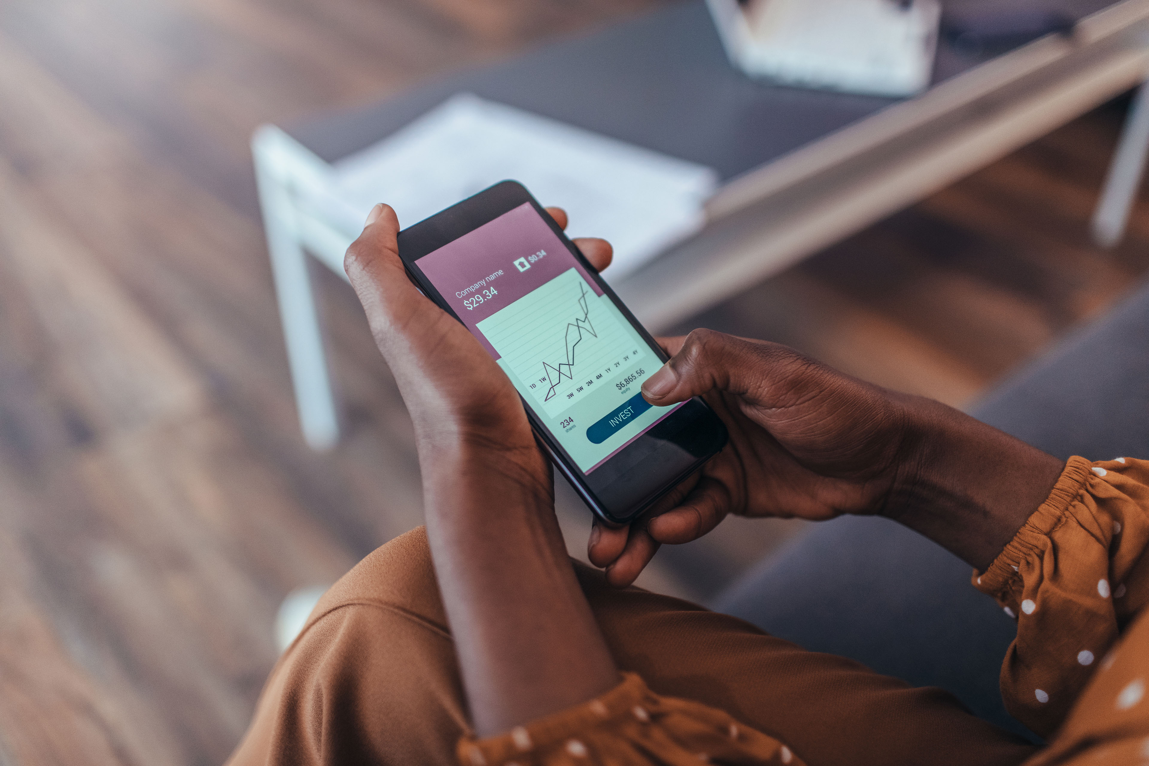 Close up of women's hands holding smartphone