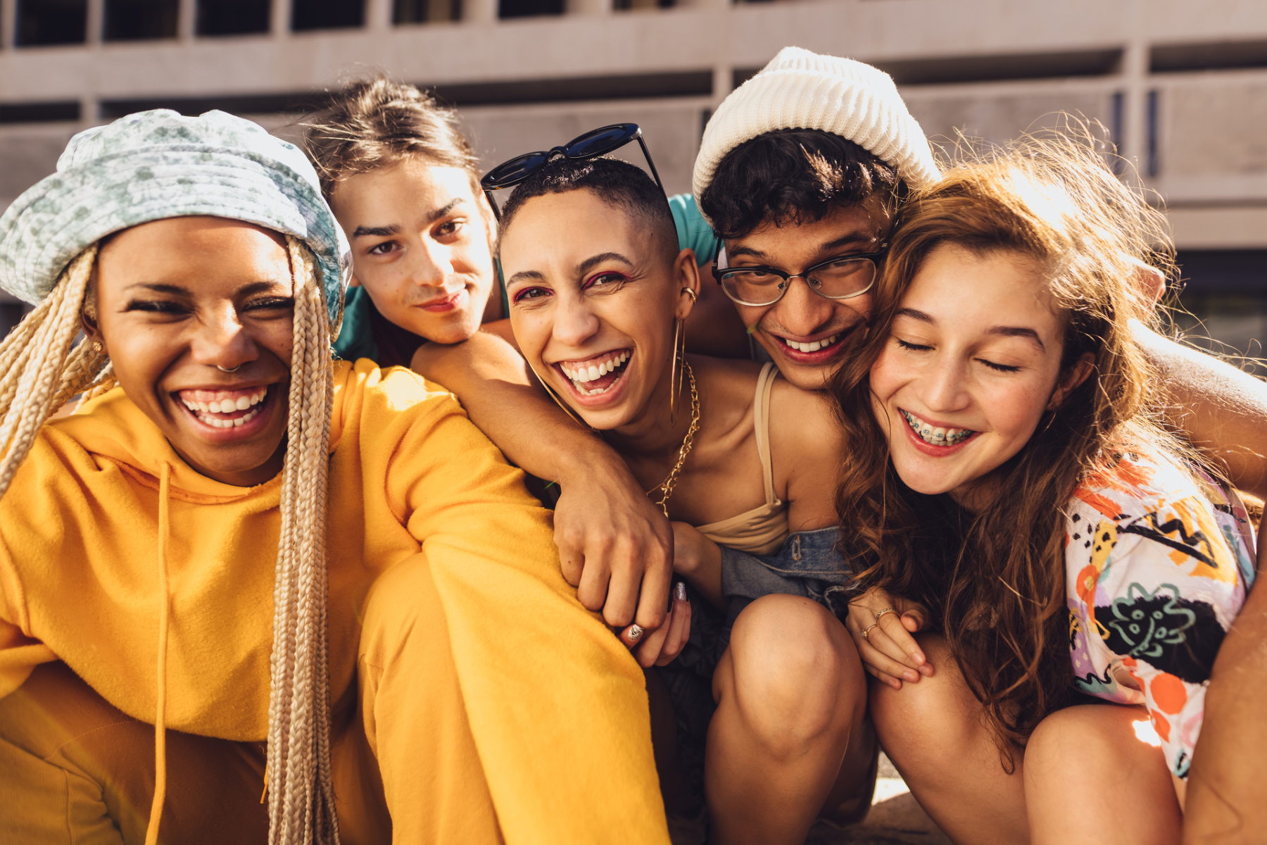 Group of friends are laughing while taking selfie