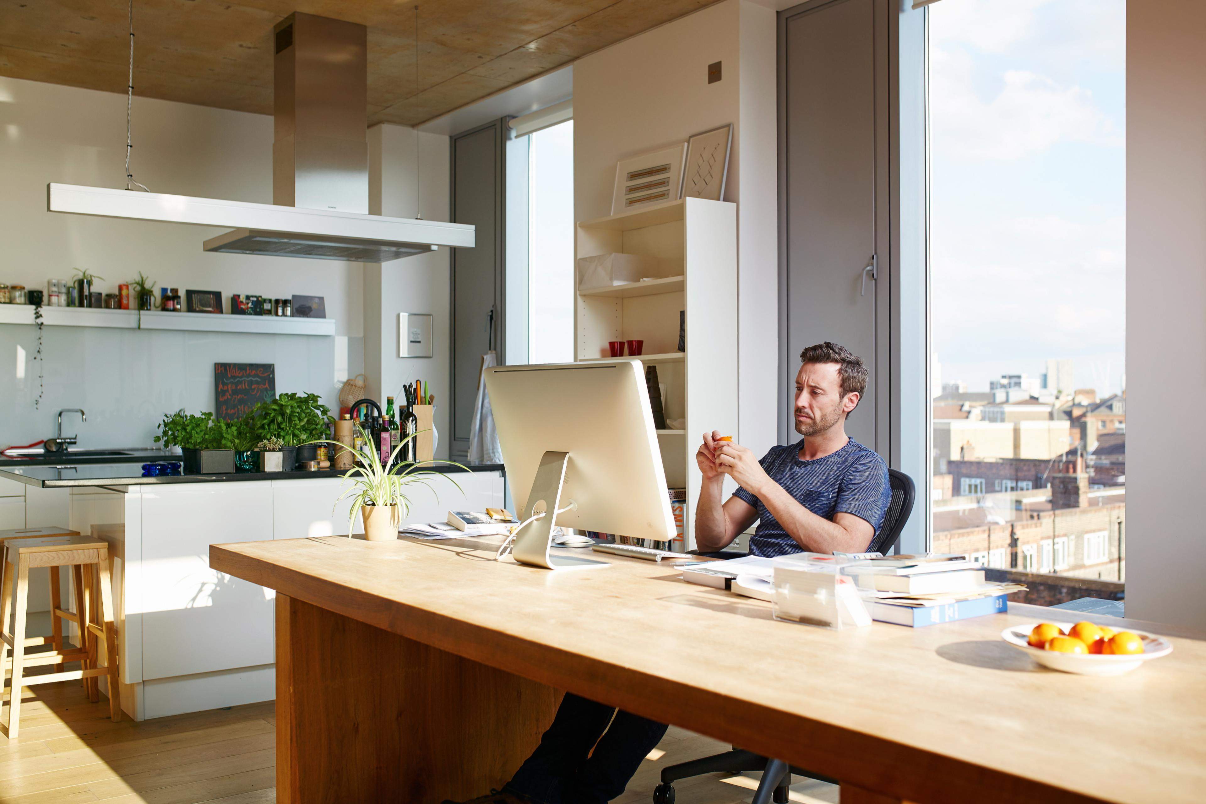 A man watching at desktop