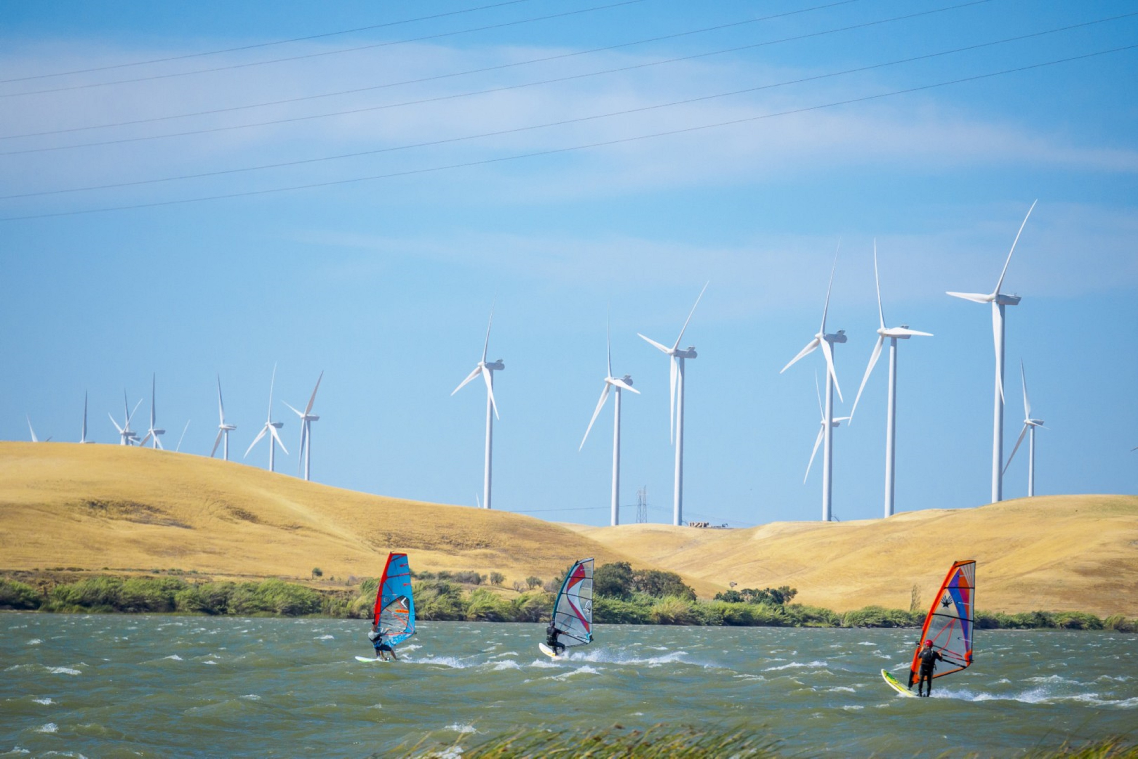 windmills near lake