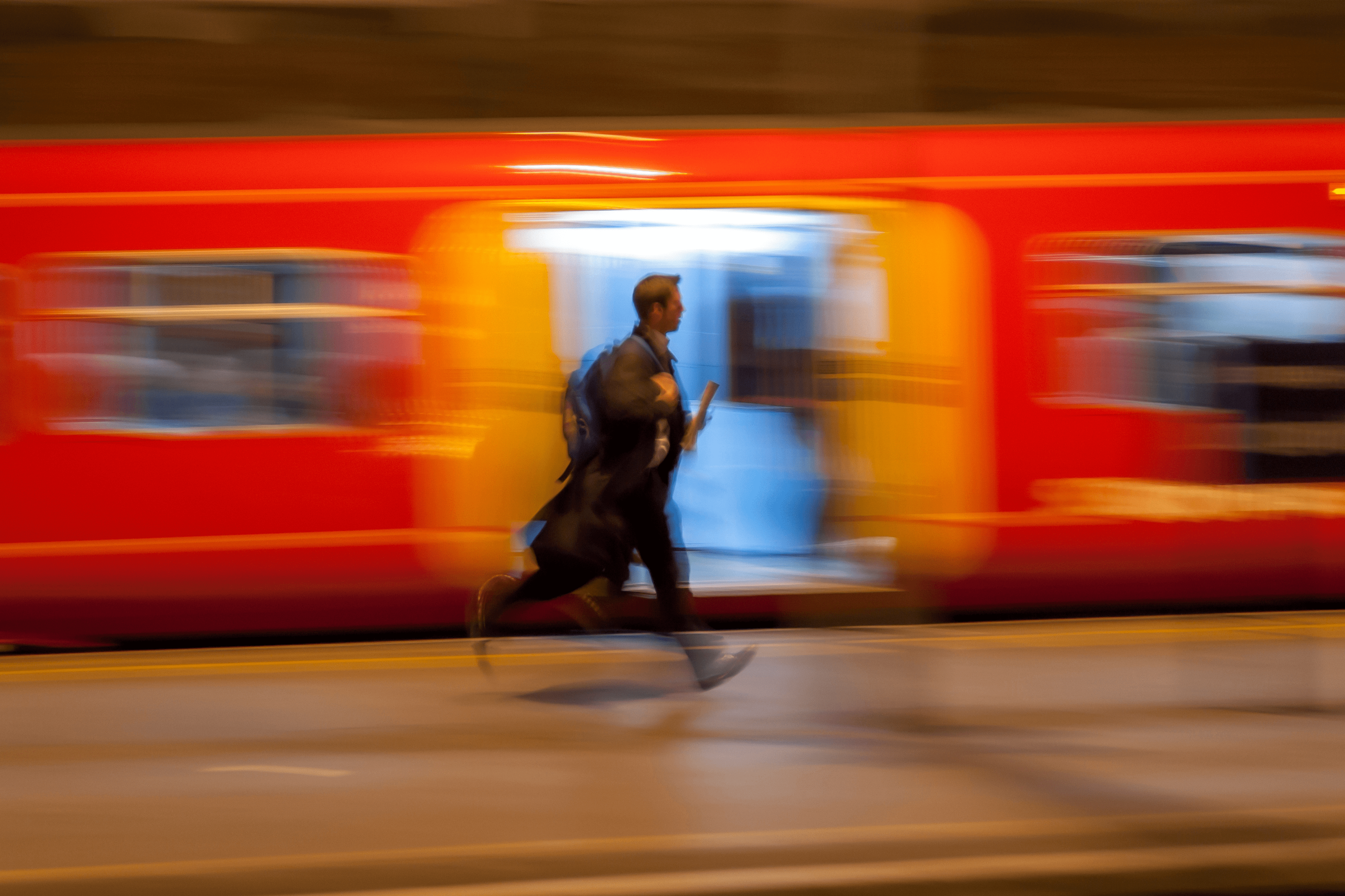 A man running along the train