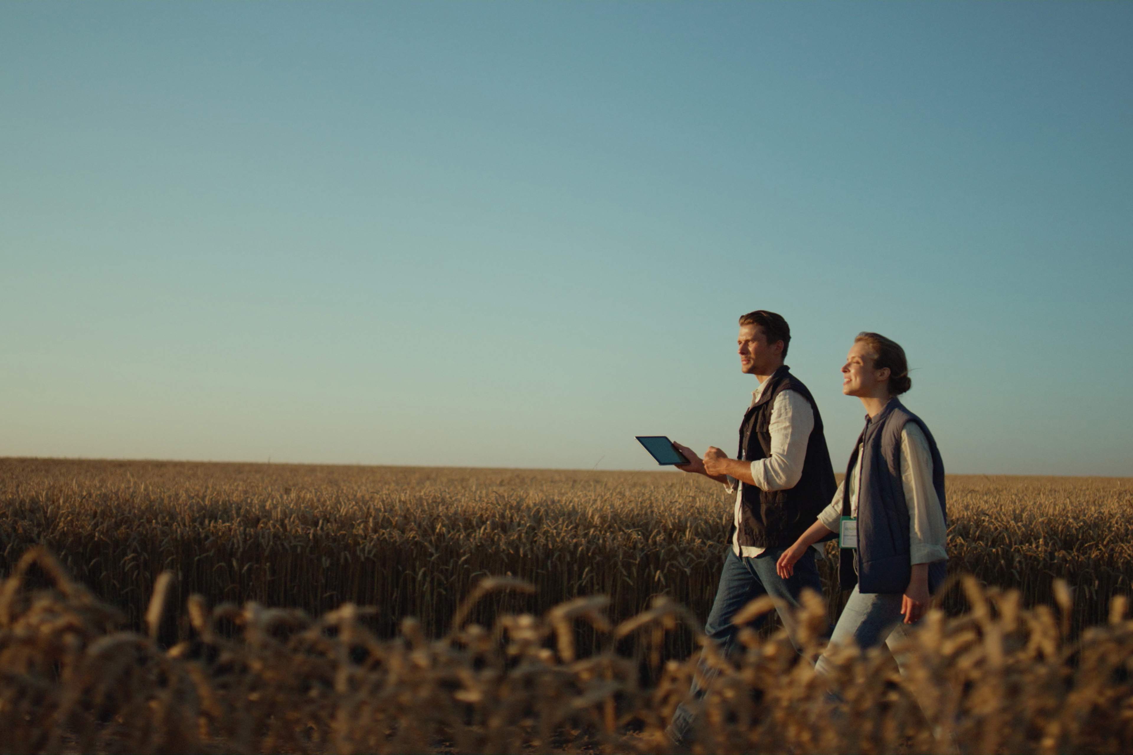 Man and woman using tab